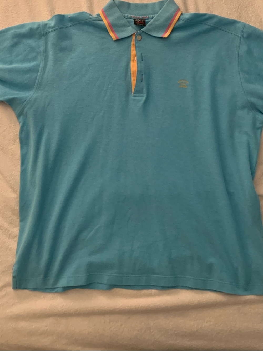 Paul & Shark blue polo with pink and yellow accents